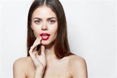 Charming Woman Holds Hand Near Face Red Lips Clean Skin Bare Shoulders