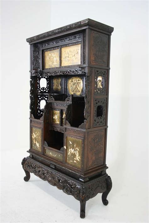 Each panel contains elaborately carved arches or lines that add detail to the overall. Antique Japanese Black Laquered Inlaid Shadona Display ...