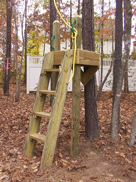 A safer design might be to have a seat the child sits on a few feet. Zipline Platform Close up | Zip line backyard, Simple tree ...