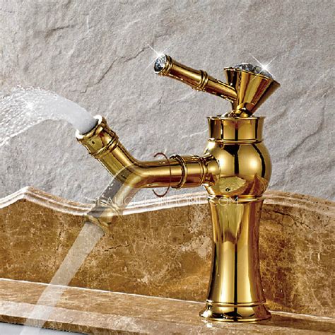 The most common brass faucet bathroom material is metal. Cheap Golden Brass Rotatable Spout Bathroom Faucet Single Hole