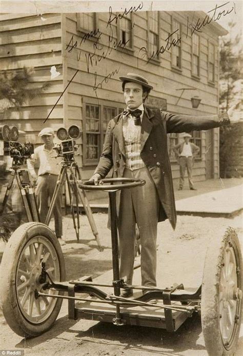 Photo Shows Silent Movie Actor Buster Keaton Riding A Crude Version Of