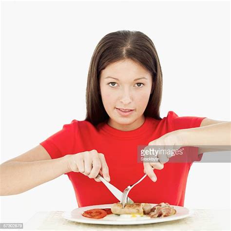Girl Eating Sausage Photos And Premium High Res Pictures Getty Images