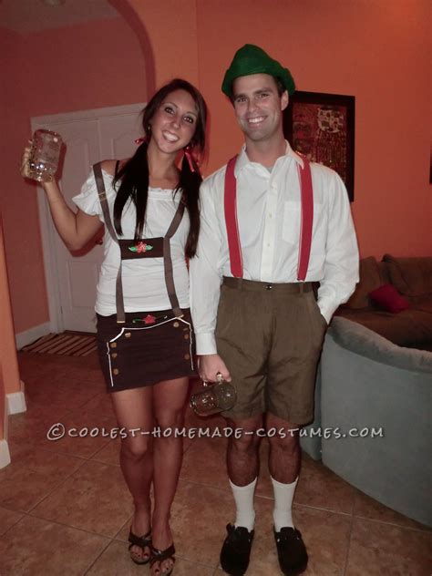 A Man And Woman Dressed Up In Costumes