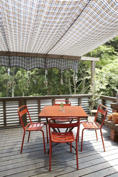 Top 35 diy outdoor shade canopy. DIY: Rock Weights for a Sun Shade - Gardenista