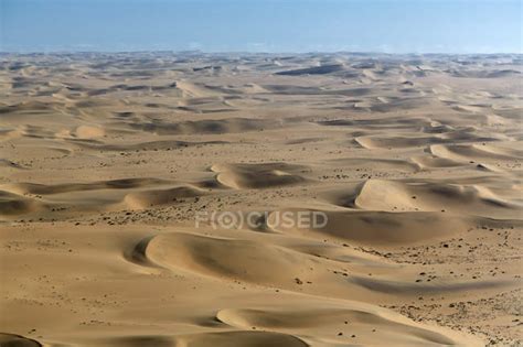 Aerial View Of Sand Dunes Under Blue Sky — Dry Africa Stock Photo