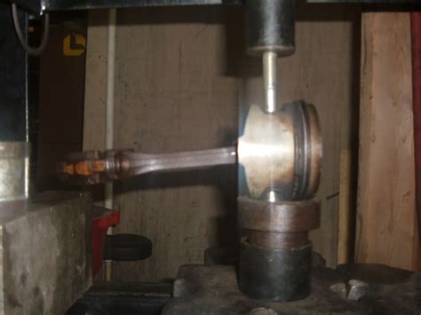 Rod lays on a horizontal shelf welded to the front side of 2x pipe fitting, and small end inserts to center of x. How to R&R pistons and Balance Rods - Miata Turbo Forum ...