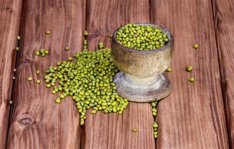 Premium Photo Fresh Green Peas In A Wooden Bowl