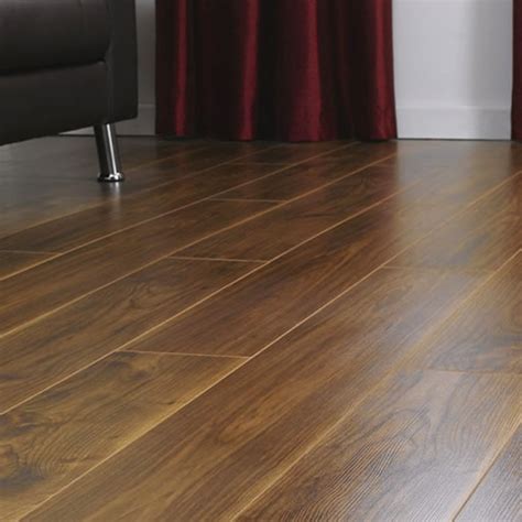 For large, open spaces, you will want a glue down vinyl. Krono Vario+ 12mm Virginia Walnut 4v Groove Laminate ...