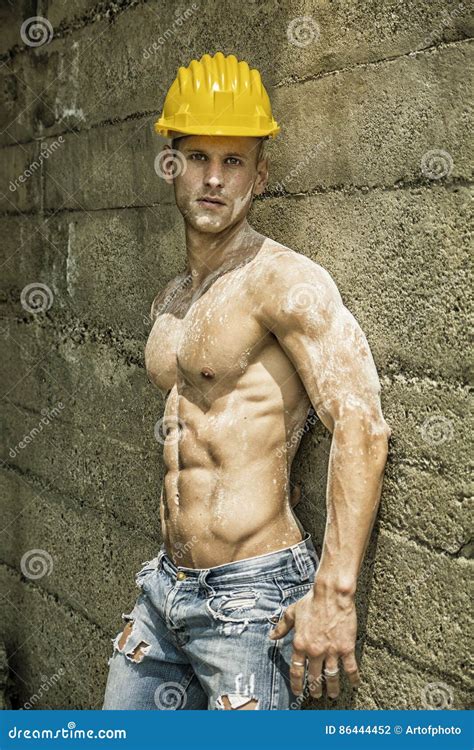 Hot Muscular Construction Worker Shirtless Seen From Below Stock Image