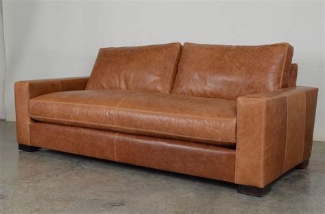 Elevate your living room's style with this saddler leather sofa. Our Monroe Sofa in Pure Saddle leather. Pure comfort. # ...