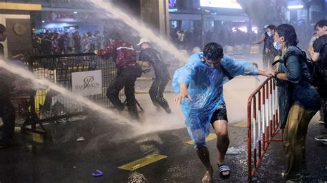 Thailand Police Use Water Cannon Against Protesters In Bangkok As Pm Refuses To Quit World