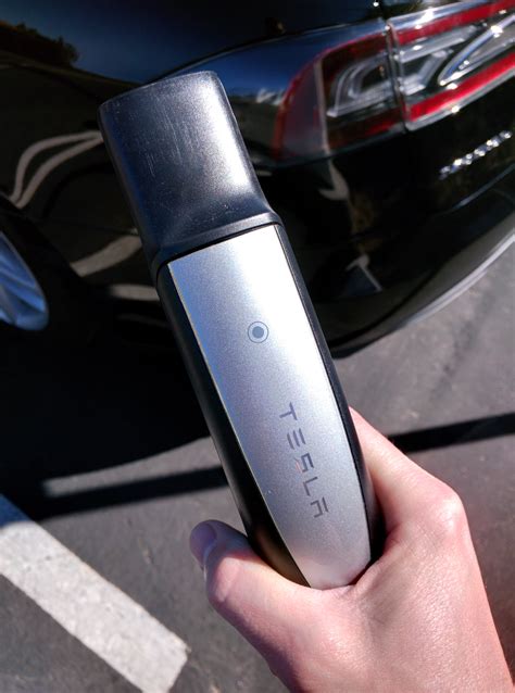 New Touch Sensitive Buttonless Tesla Supercharger Plugs Being Tested