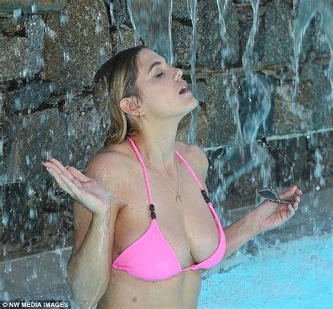 Ashley James Narrowly Avoids Wardrobe Malfunction In Skimpy Pink Bikini