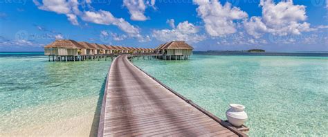 Sunny Maldives Island Luxury Water Villas Resort And Wooden Pier