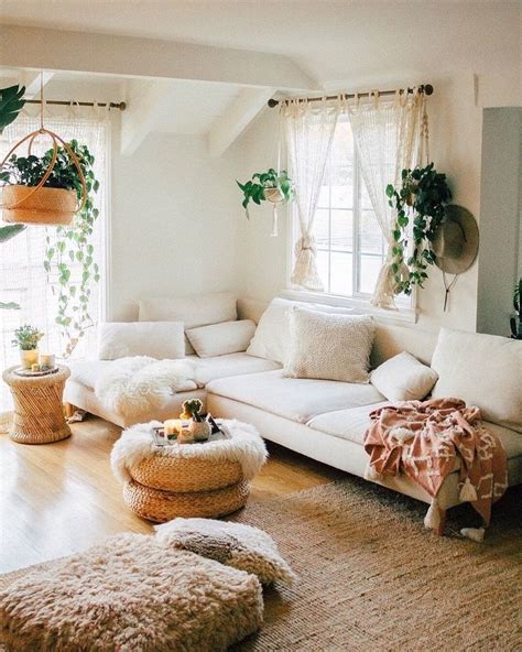 Cream Colored Living Room With Brown Rattan Rug Plants