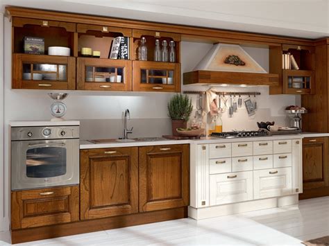 Si possono utilizzare a questo scopo delle aste di legno ci circa 3×3 cm, che si ancoreranno ai muretti con le apposite la cucina in muratura moderna invece viene costruita utilizzando piastrelle moderne. Cucina in legno con maniglie LAURA | Cucina in legno ...