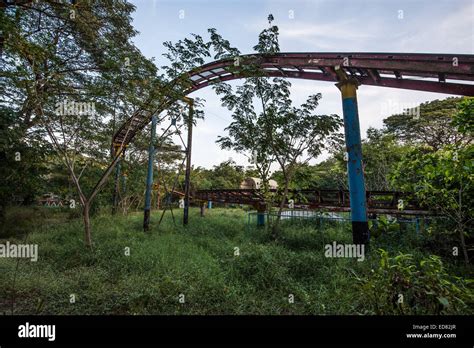 Rusty Roller Coaster Tracks At Yangon Abandoned Amusement Park Stock