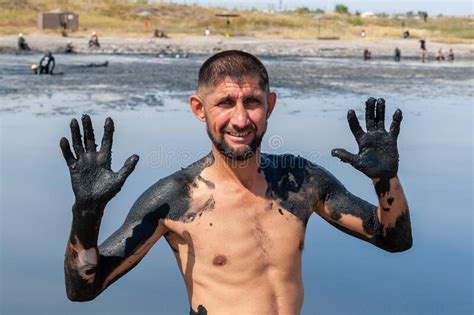 Salty Mud Medicinal Lakes Of Sol Iletsk A Man Shows His Hands Smeared