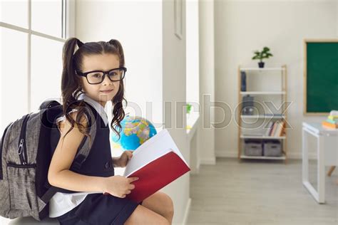 Back To School Schoolgirl In Glasses Stock Image Colourbox