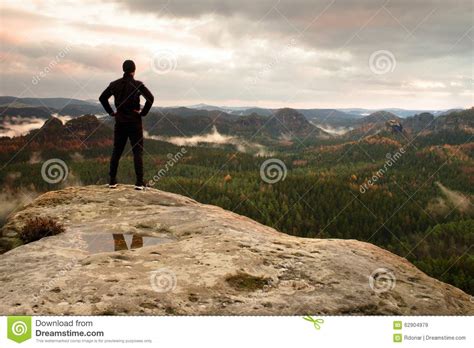 Slim Tall Tourist On Sharp Peak Of Rock In Rock Empires Park Is