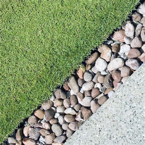 Use unevenly cut rocks to create a partition between two terracotta tile edging. Top 40 Best Stone Edging Ideas - Exterior Landscaping Designs