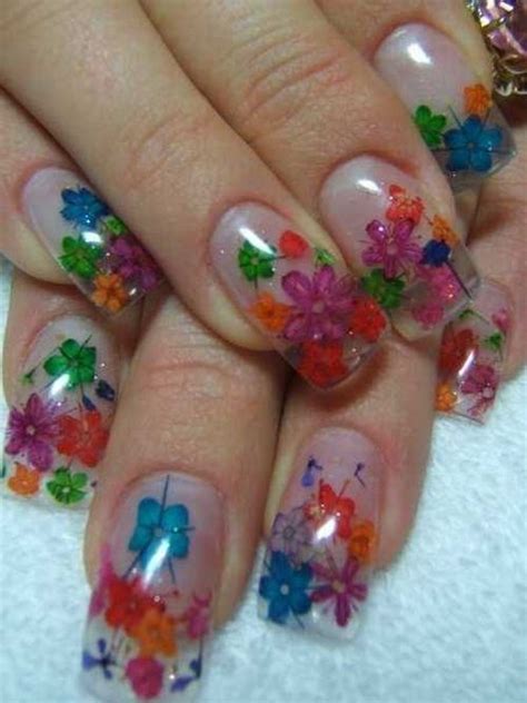 I started making these decals a few years ago when pressed flowers became really popular for nail art. Day 104: Inlaid Dried Flowers Nail Art - - NAILS Magazine