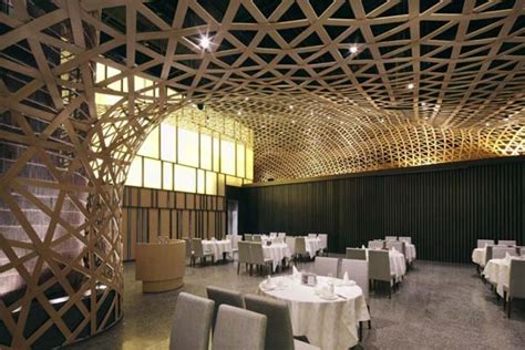 Bamboo architecture and design including framework pavilions, housing, thatched roof buildings in vietnam, interiors and laminated furniture. Modern restaurant design featuring cool bamboo elements