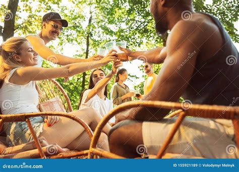 Happy Friends Are Having Beer And Barbecue Party At Sunny Day Stock Image Image Of Family