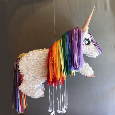 #birthdayfun #piñata #unicorn #rainbow This colorful sweetie just wants ...