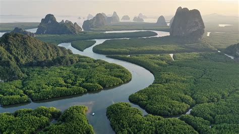 Aerial View Of Phang Nga Bay Mountains And Rainforest At Sunset