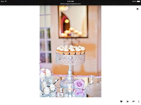 Modern Silver And Mirrored Display By Tulip And Teacups For The Dessert
