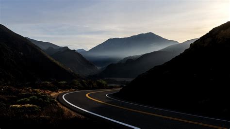 Download Wallpaper 1366x768 Road Curve Highway Mountains Morning