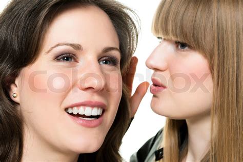 Two Woman Whisper Stock Image Colourbox