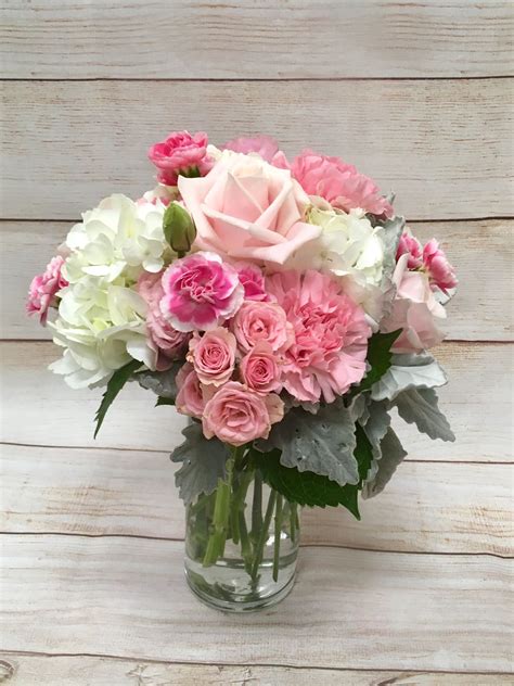 Pretty N Pink Centerpiece Made Of Hydrangea Roses And Mini Carnations