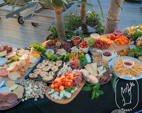 The amount given as an appetizer is usually the size of 1/2 cup. How to make a grazing table for a large group, including how much food you should buy per person ...