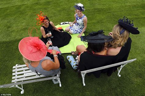 Racegoers Turn Epsom Into A Riot Of Colour On Ladies Day Daily Mail