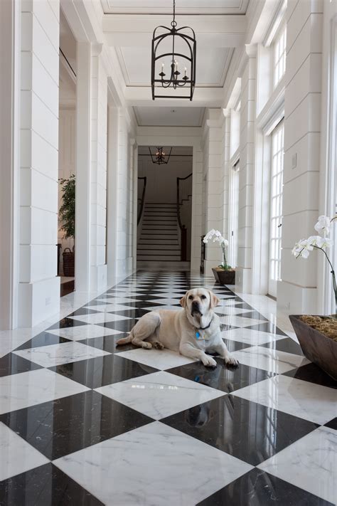 Marble tiles for grand floor design. Formal Black and White Marble Entry | Foyer design, Black ...