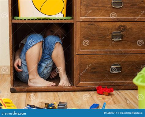 Little Boy Hiding In A Cupboard Stock Image Image Of Childhood