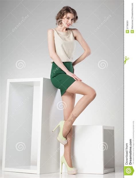 Beautiful Woman With Long Sexy Legs Dressed Elegant Posing