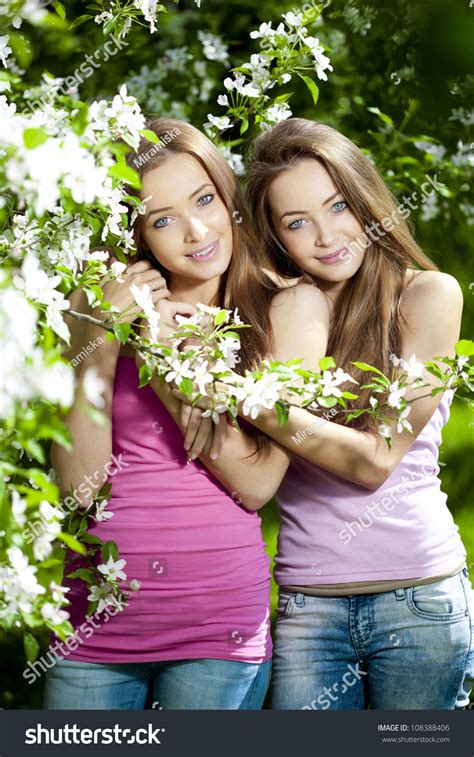 Beautiful Twins With Flowers Stock Photo 108388406 Shutterstock