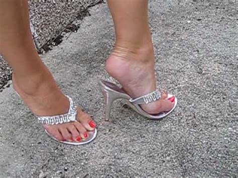 Mature Feet In High Heeled Wooden Wedge Mules With A Nice Surprise