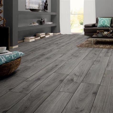Grey's a great base for a modern living room. Rich Grey Oak 8mm Laminate Flooring - Floor Depot