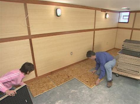 Sub floor panels installed in empty basement. How to Install Subfloor Panels | how-tos | DIY