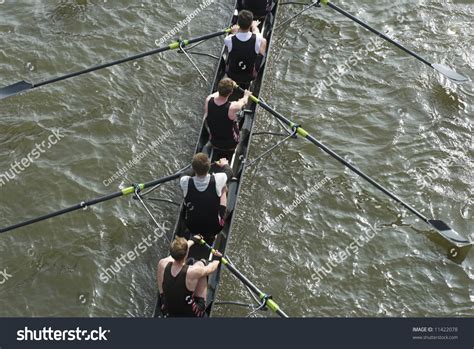 Rowers In Eight Oar Rowing Boats On River Thames In London England