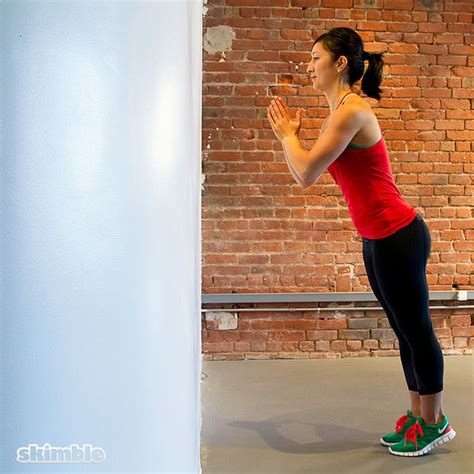Wall Push Ups With Clap Exercise How To Workout Trainer By Skimble