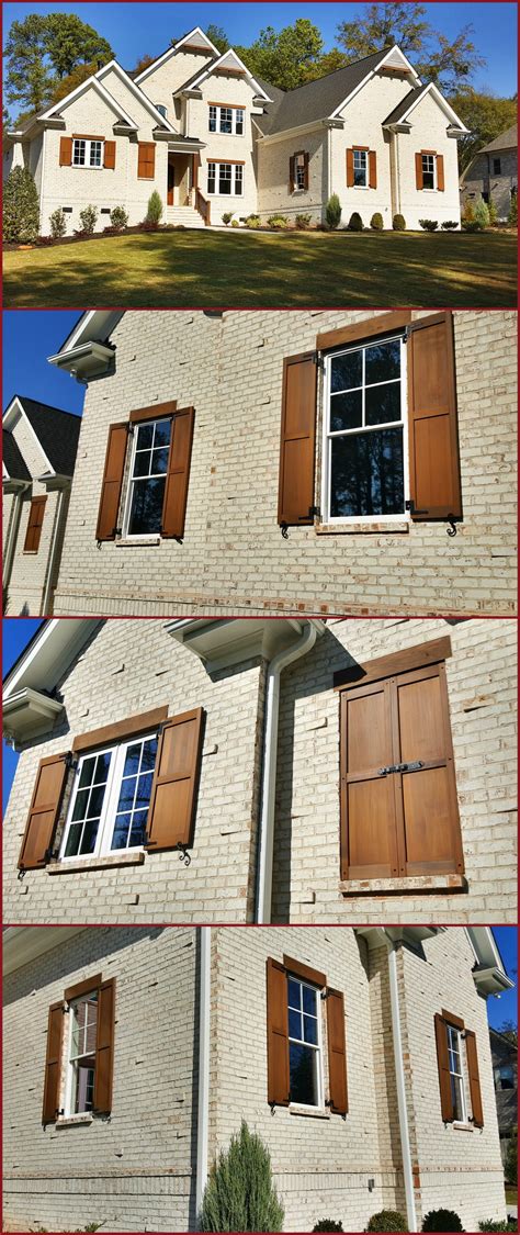 Custom Built And Stained Exterior Cedar Shutters On White Brick House