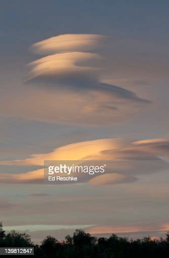 Lenticular Clouds At Sunrise Lenticular Clouds Are Stationary