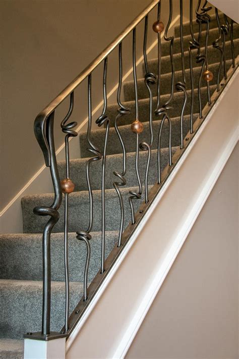 Installing hardwood treads on stairs with new metal spindles. Knotted Steel Stair Spindles | Metal stairs, Stair ...
