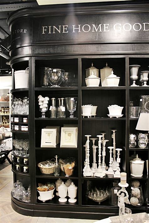Black Shelving With Trim And Mouldings For Merchandise Displays