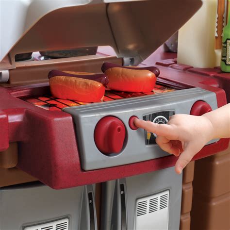 This playhouse by smoby is tough, durable, and suitable for outdoor use. Outdoor Playhouse with Kitchen Inside